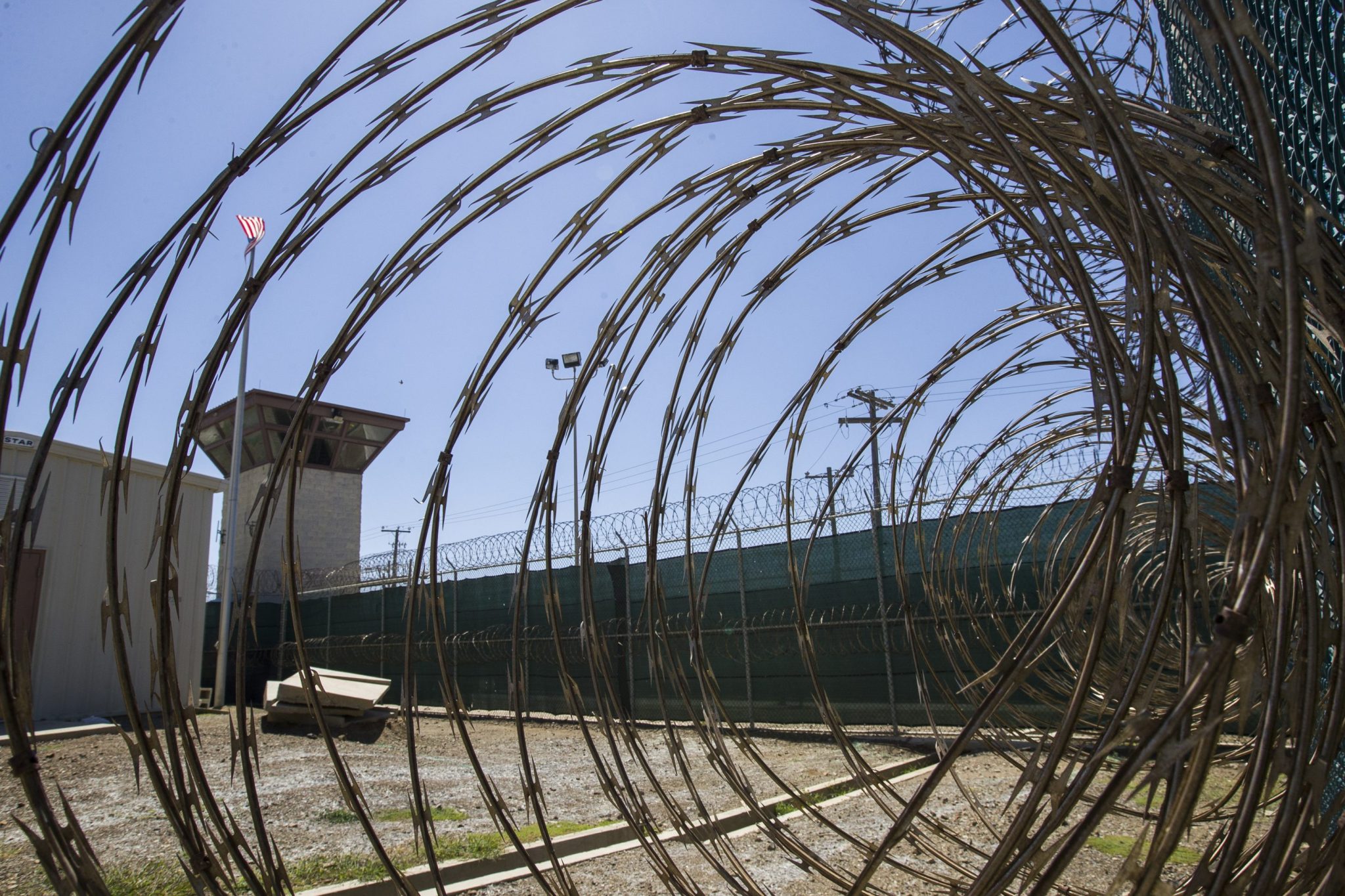 Guantanamo Bay receives first military flight with migrants deported from the U.S.