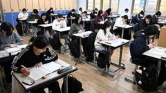 Teacher and parent held for breaking into school to steal exam papers